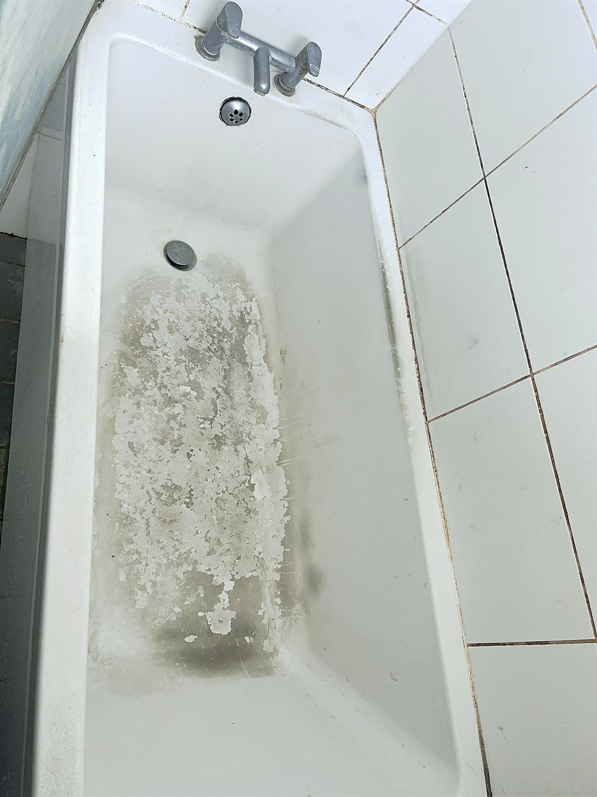 Before: White bath after cleaning