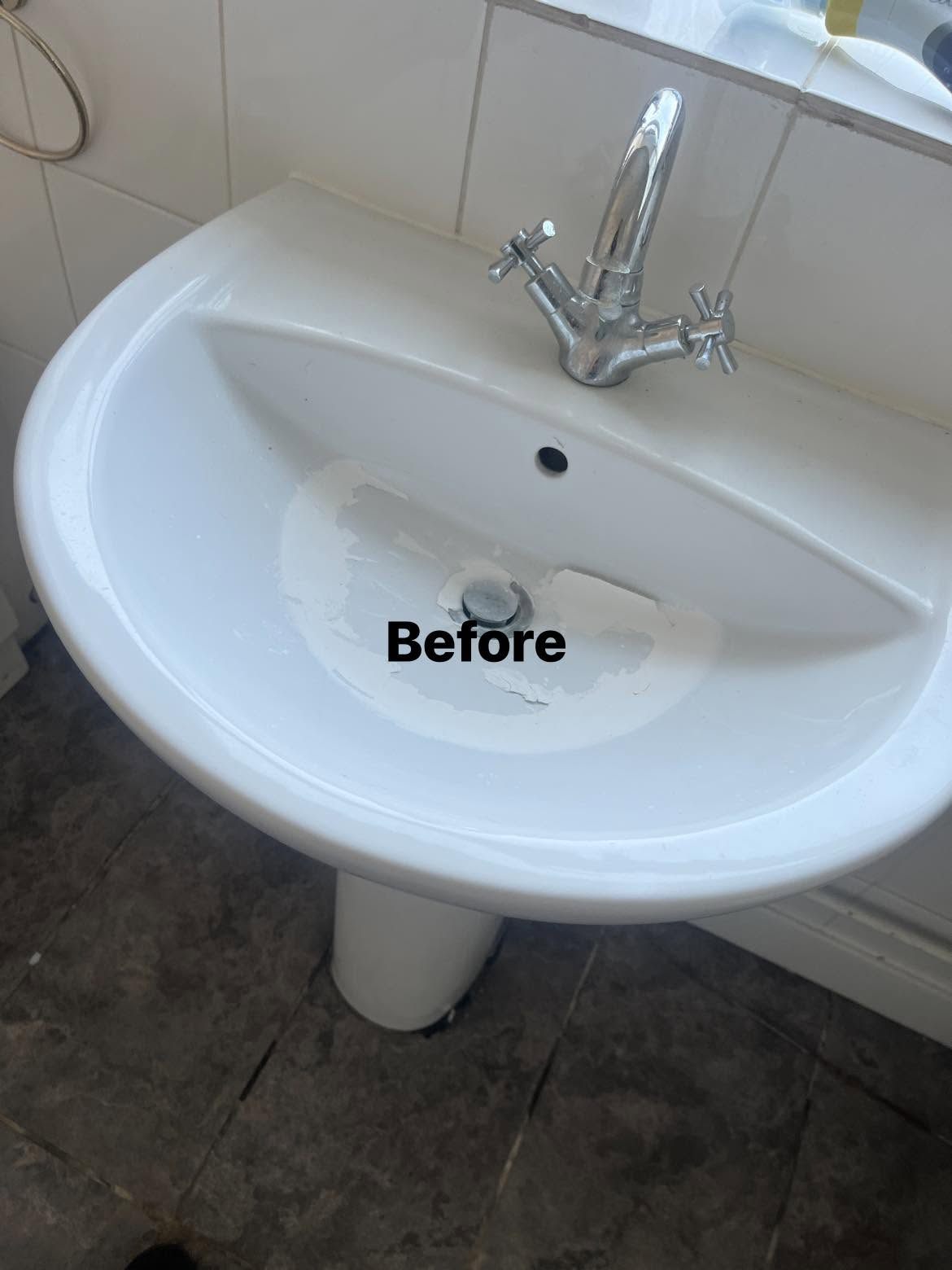 Before: White pedestal sink with mixer tap after cleaning